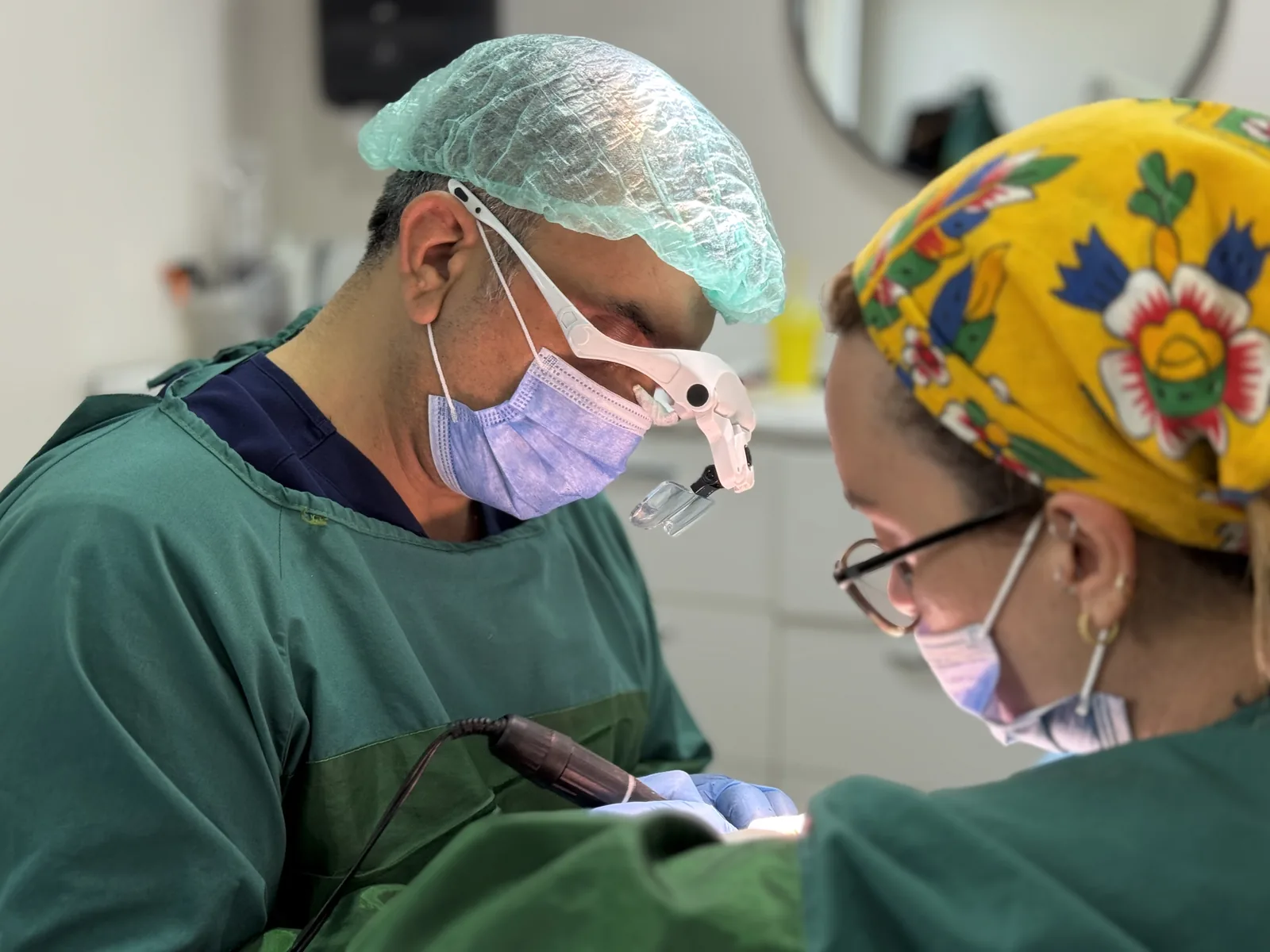 Dr. Arslan Musbeh performing a hair transplant procedure
